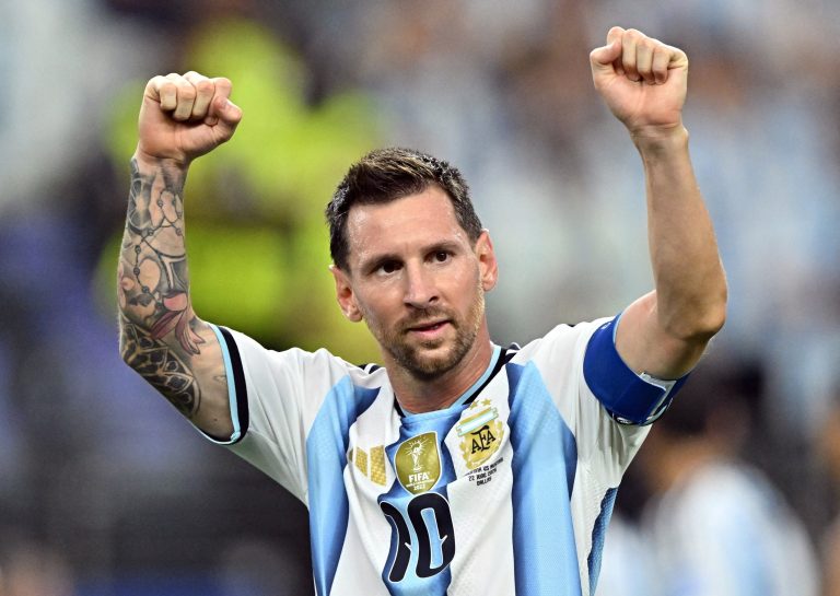 Messi breaks World Cup scoring record as Argentina seal knockout place