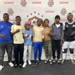 In the picture is Thembelani Majingo with the boys international ( Dinaledi Football Academy) Botswana