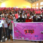 Students from Kaharo Girls High School, Murang'a county, cheer their guests from MKU College of Health Sciences