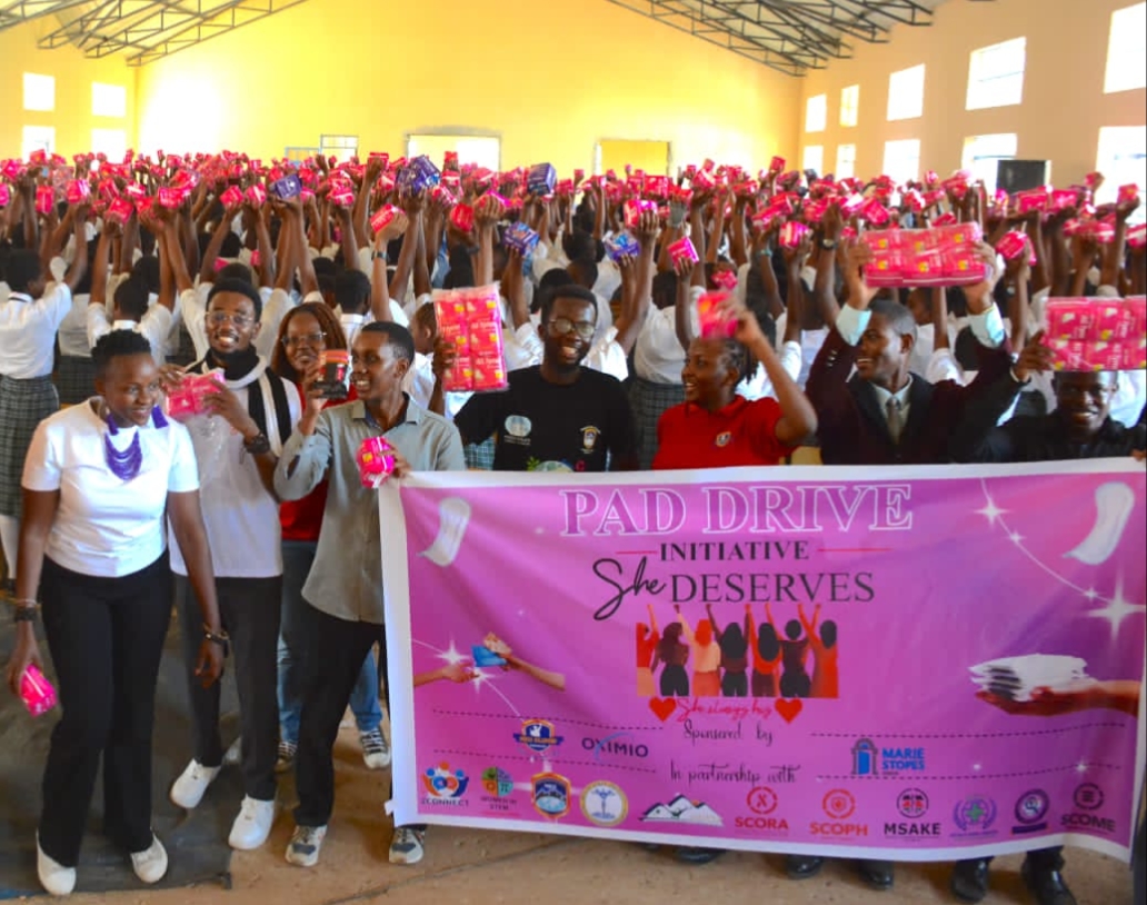 Students from Kaharo Girls High School, Murang'a county, cheer their guests from MKU College of Health Sciences