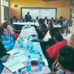 Amb. Eugene Kavune Nzabonimba addressing the delegates.