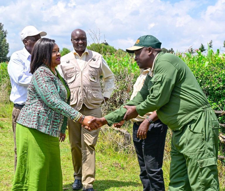 Cabinet Secretary Rebecca Miano (L) is received by field officers during an official field tour evaluating ongoing regional initiatives.