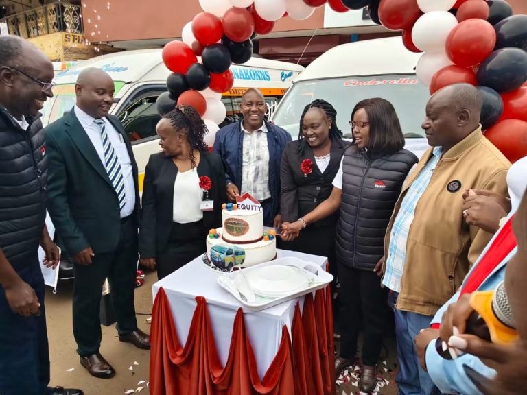 Equity bank and NAKKONS officials cutting a cake to celebrate the commissioning ceremony on Friday.