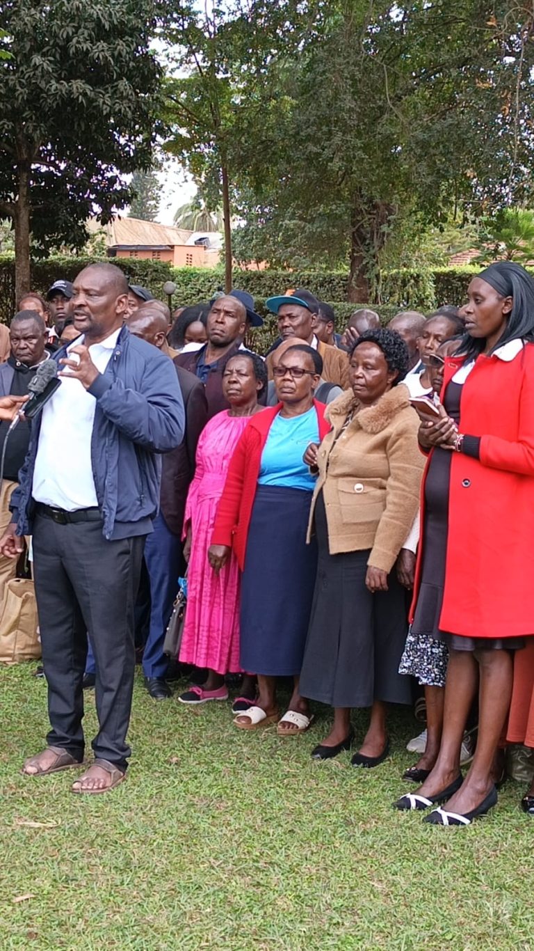 MMV Associates CLG Director General James Njuguna Mahuria addressing journalists as other members, led by CEO Emmah Cherotich Kasis (right) looks on.