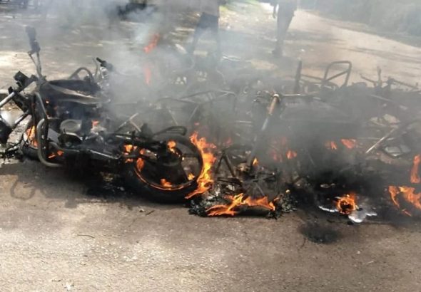 Motorcycles burnt outside St Stephen's Cathedral in Kisumu