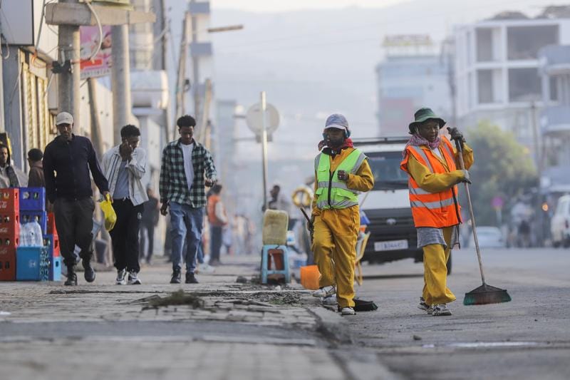 People take part in the annual summer cleanup campaign in Addis Ababa, the capital of Ethiopia on Tuesday.