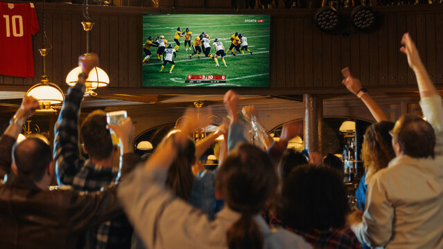 Football fans in South Africa watching TV