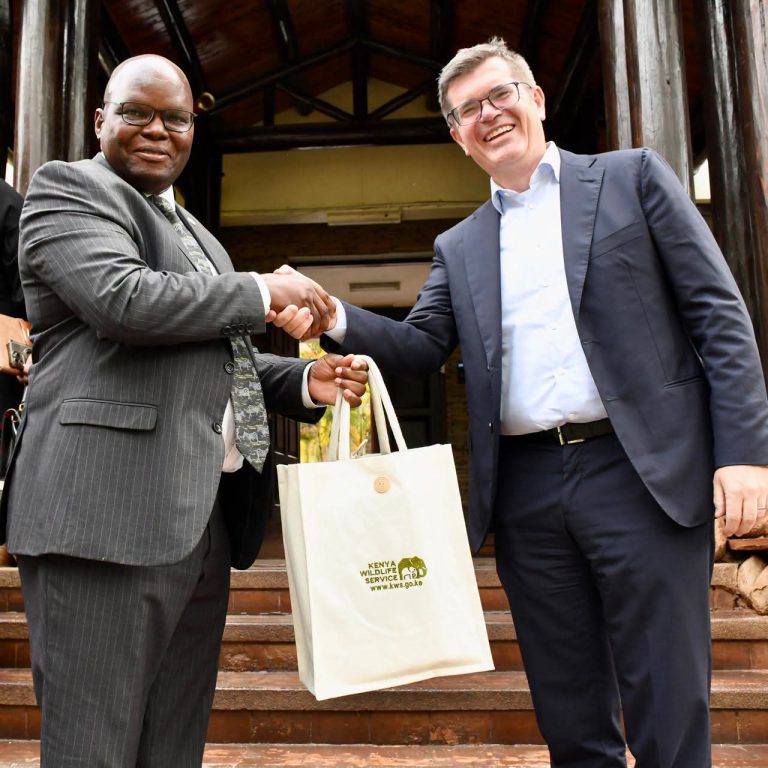 Kenya Wildlife Service Director General Dr. Erustus Kanga (L)