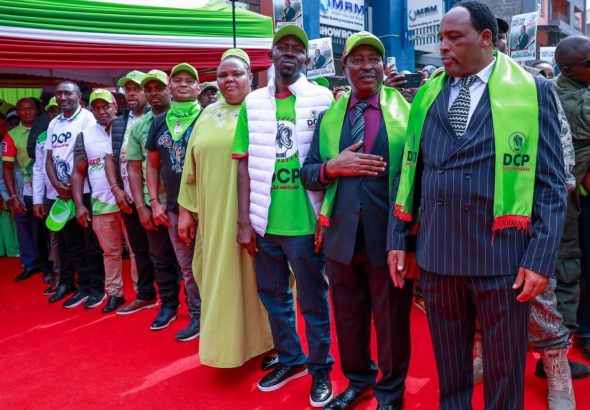 Peter Mwathi, the DCP Deputy National Chairperson (second right) and other officials during the opening of Kiambu offices