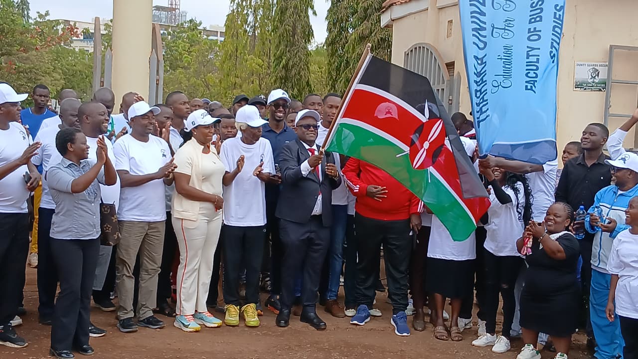 Tenri Group of Hospitals CEO Dr. Jim Njamiu, PhD, HSC, flags off Tharaka University's 530-kilometre charity walk.