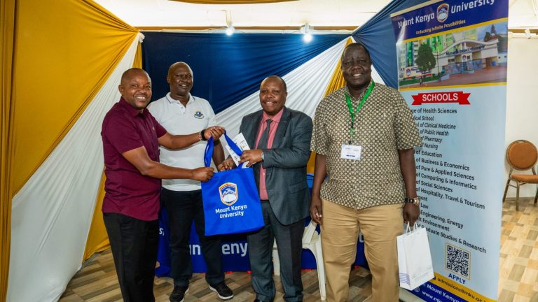 Chief Guest - Chief Executive Officer and Registrar KMPDC, Dr David G. Kariuki (2nd Right) with Director KMPDC Moses Kiptanui