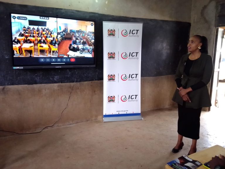 East African Community Principal Secretary Dr Caroline Karugu interacting with learners at Nyaribo Primary School in Nyeri County