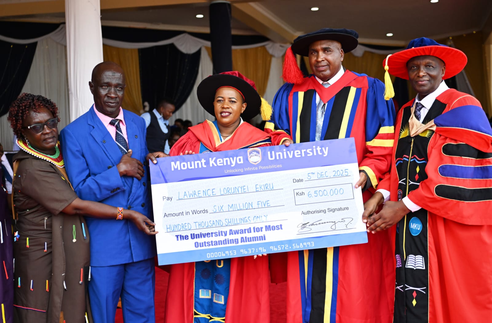 Inaugural Alumni Award winner 2025 with MKU senior officials led by founder Prof. Simon Gicharu.
