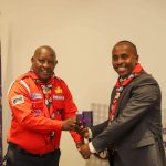 Nyeri Governor Mutahi Kahiga shakes hand with and Dagoretti South MP John Kiarie
