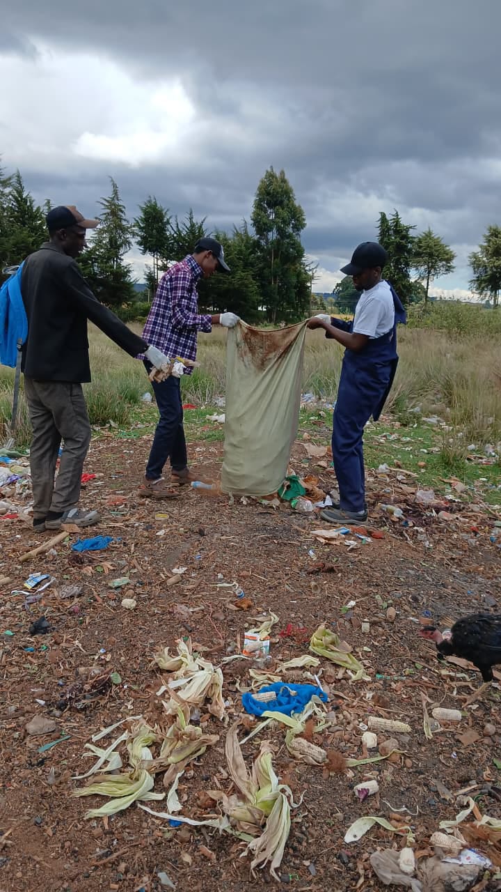 Laikipia University students cleaning shopping centre