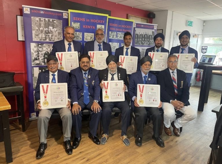 Sikh Union Club Nairobi Olympians and World Cup players with their Certificates iof Recognition. Standing L-R: Ravinder Singh Laly, Manjeet Singh Panesar, Ranjeev Singh Deol, Harvinder Singh Marwa, Harvinderpal Singh Sibia. Sitting L-R: Ranjit Singh Sehmi, Munai Bansal (Chairman, Centenary Celebration Committee), Davinder Singh Deegan, Surjit Singh Rihal, Kulbir Singh Bhaura (Seoul 1988 Olympic Games Gold Medallist, Great Britain).