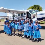 Students at the airstrip in Kitale