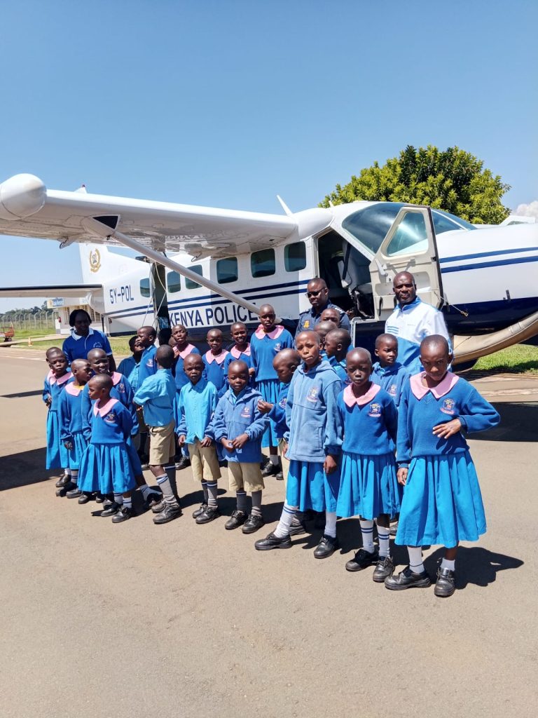 Students at the airstrip in Kitale