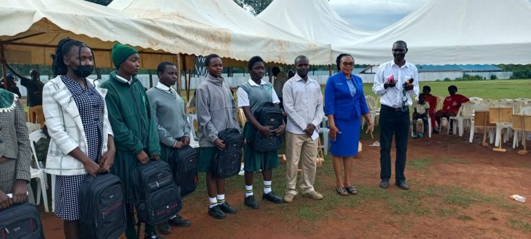 Students receiving bags from well wishers